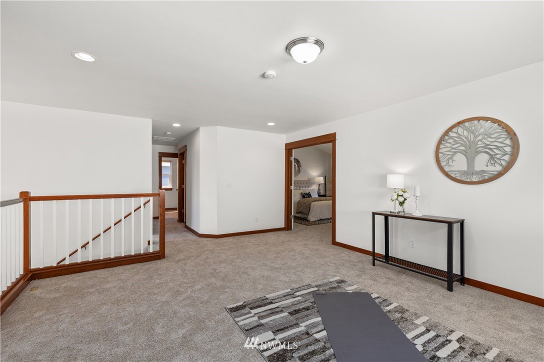 3603 222nd Place Southeast Bothell, WA 98021 - Photo 21 of 40 a view of a room with gym equipment and a large window