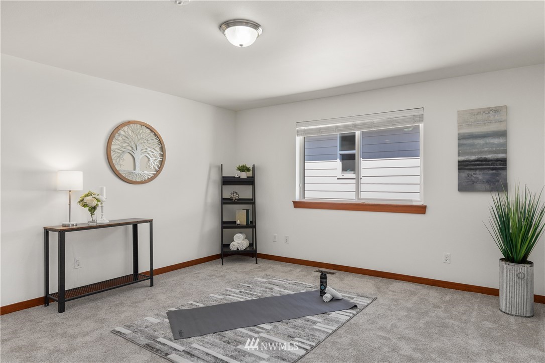 3603 222nd Place Southeast Bothell, WA 98021 - Photo 22 of 40 a view of a room with gym equipment and a window