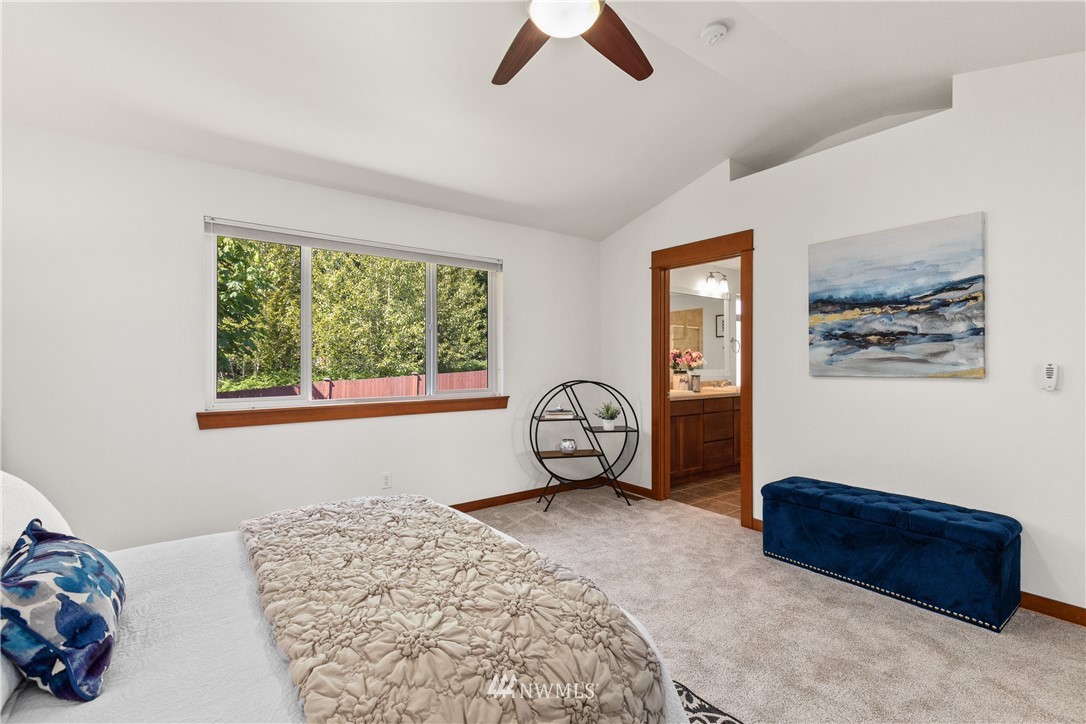 3603 222nd Place Southeast Bothell, WA 98021 - Photo 25 of 40 a bedroom with furniture and a window
