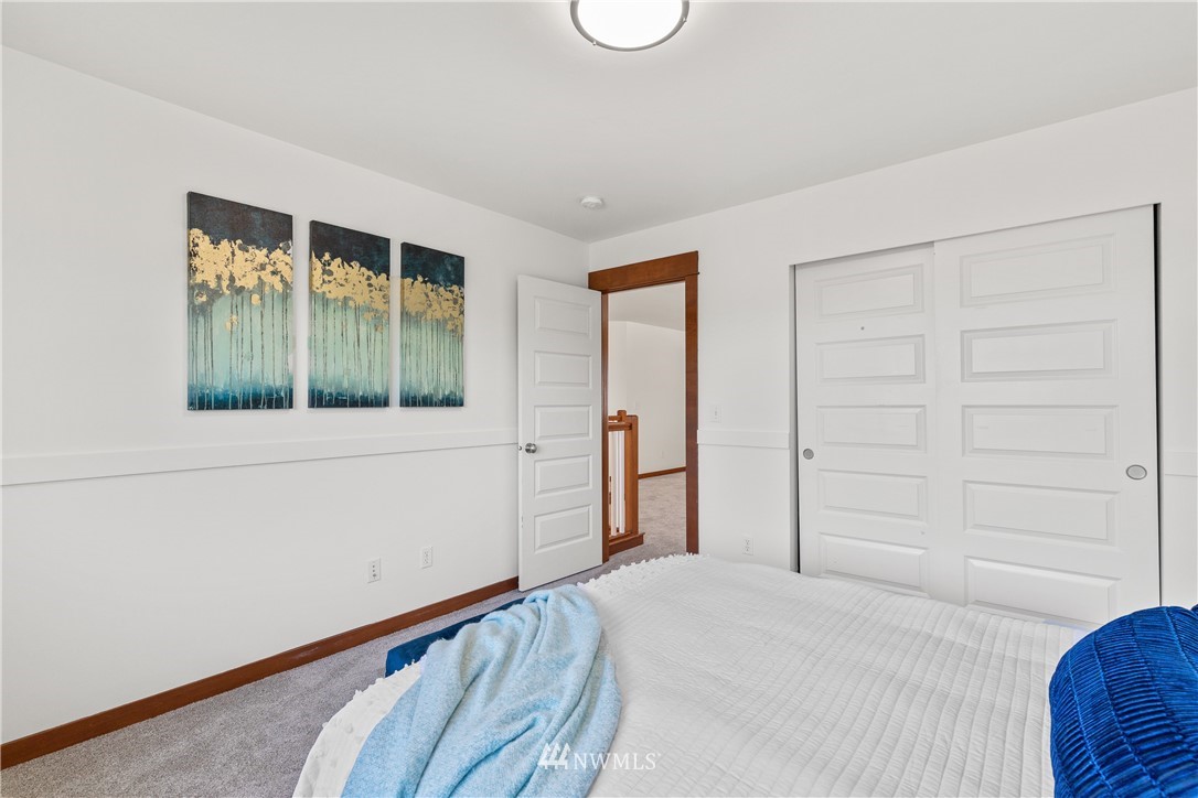 3603 222nd Place Southeast Bothell, WA 98021 - Photo 29 of 40 a bedroom with a bed and a window