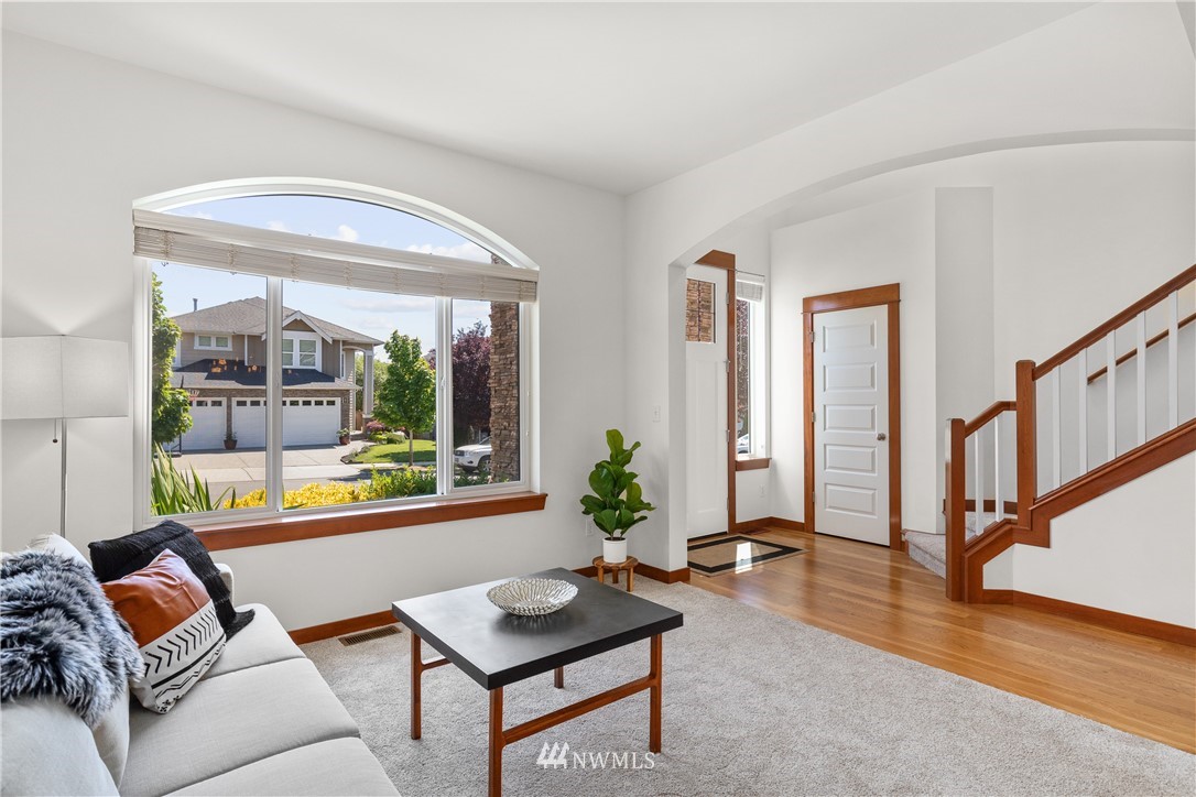3603 222nd Place Southeast Bothell, WA 98021 - Photo 4 of 40 a living room with furniture and a window