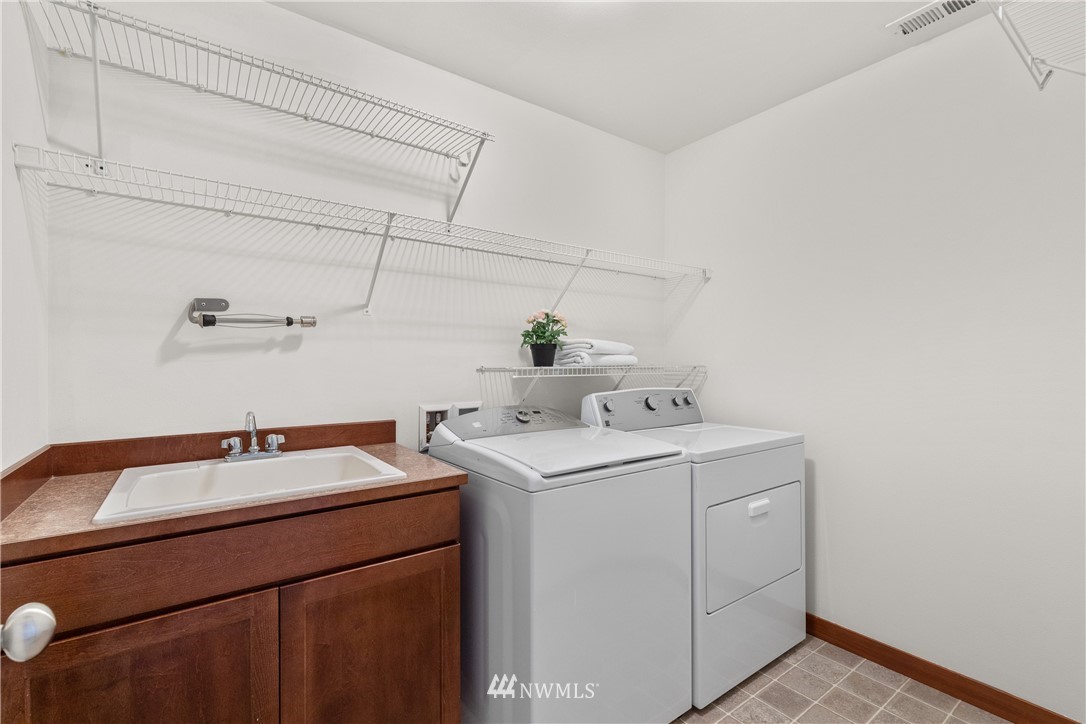 3603 222nd Place Southeast Bothell, WA 98021 - Photo 35 of 40 a utility room with dryer and washer