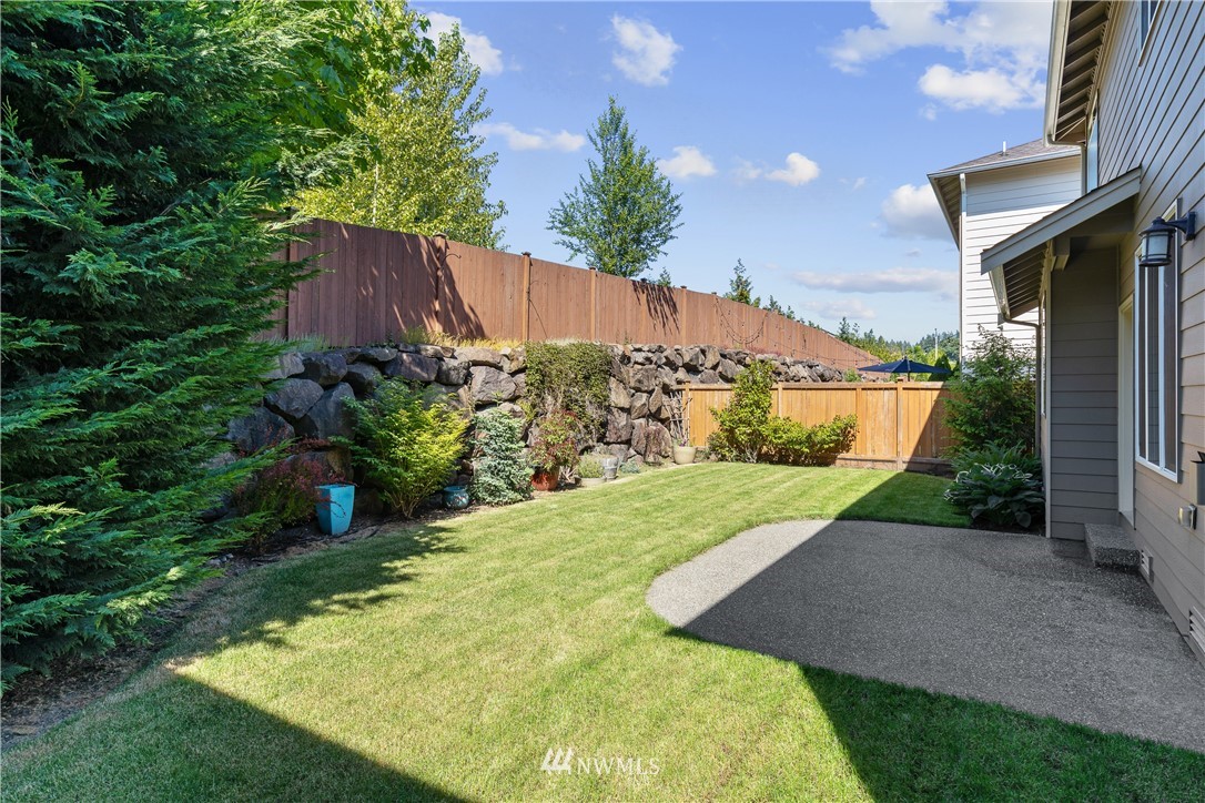 3603 222nd Place Southeast Bothell, WA 98021 - Photo 36 of 40 a view of a back yard of the house