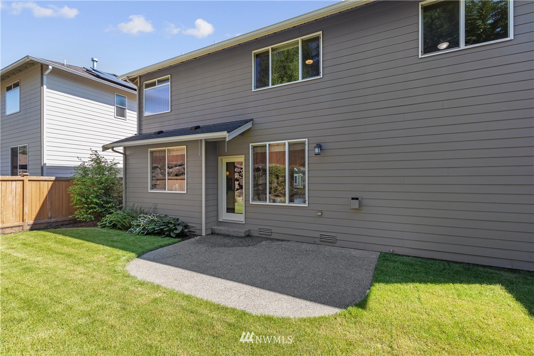 3603 222nd Place Southeast Bothell, WA 98021 - Photo 37 of 40 a front view of a house with garden