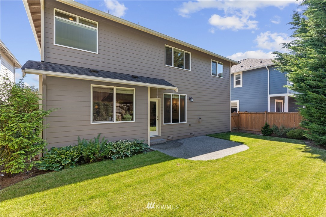 3603 222nd Place Southeast Bothell, WA 98021 - Photo 38 of 40 a front view of a house with garden