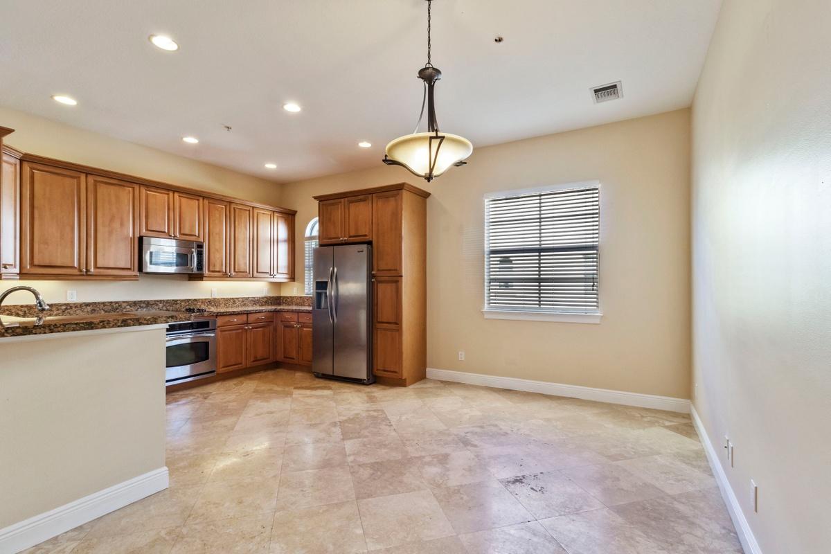 58 Via Floresta Drive Boca Raton, FL 33487 - Photo 8 of 25 2nd level kitchen & dining