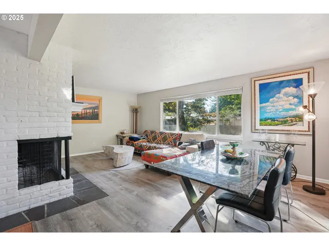 a outdoor living space with furniture and a fireplace