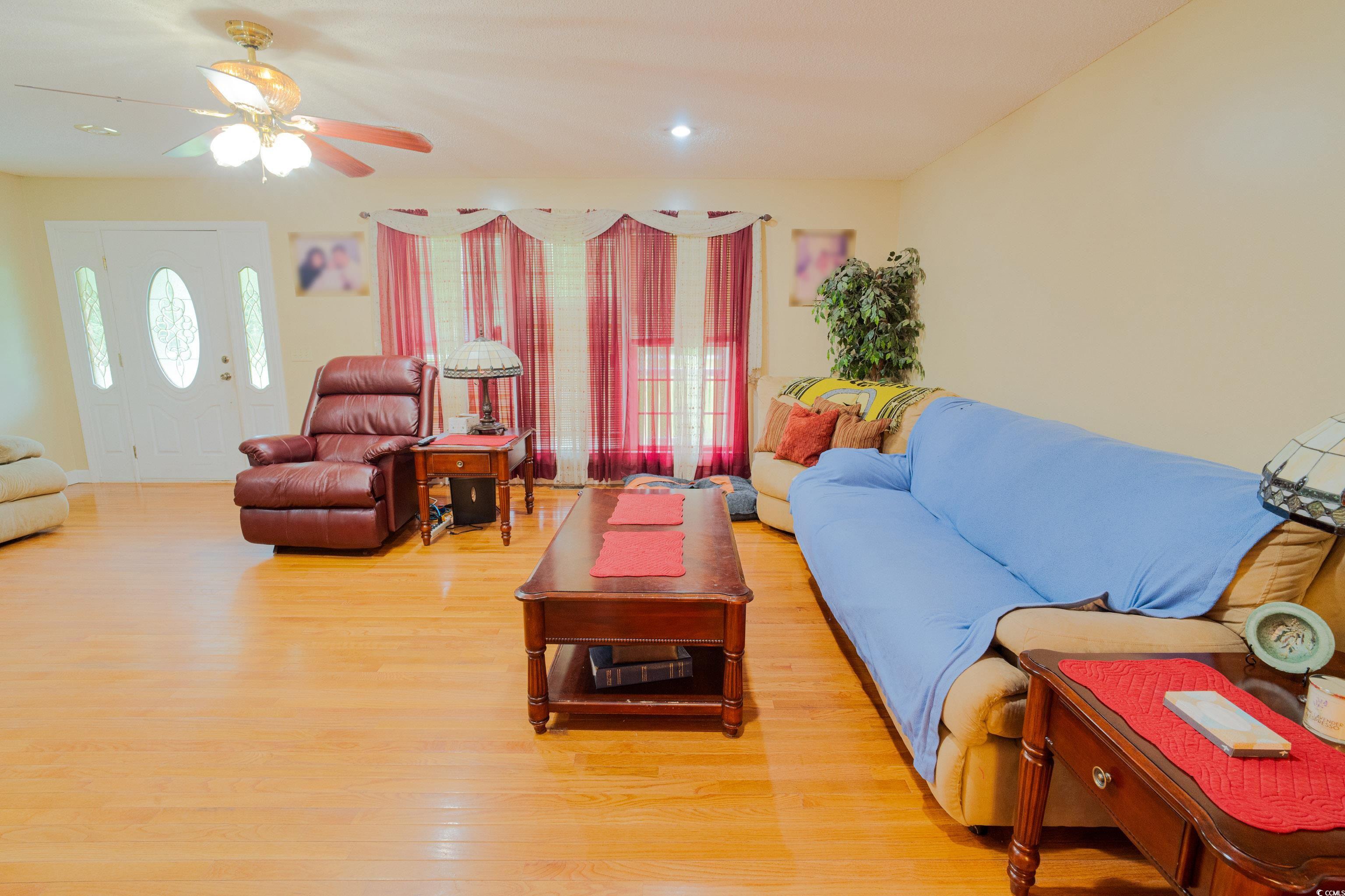 1582 Santee Road Andrews, SC 29510 - Photo 5 of 40 Living room with light wood-type flooring and a ceiling fan