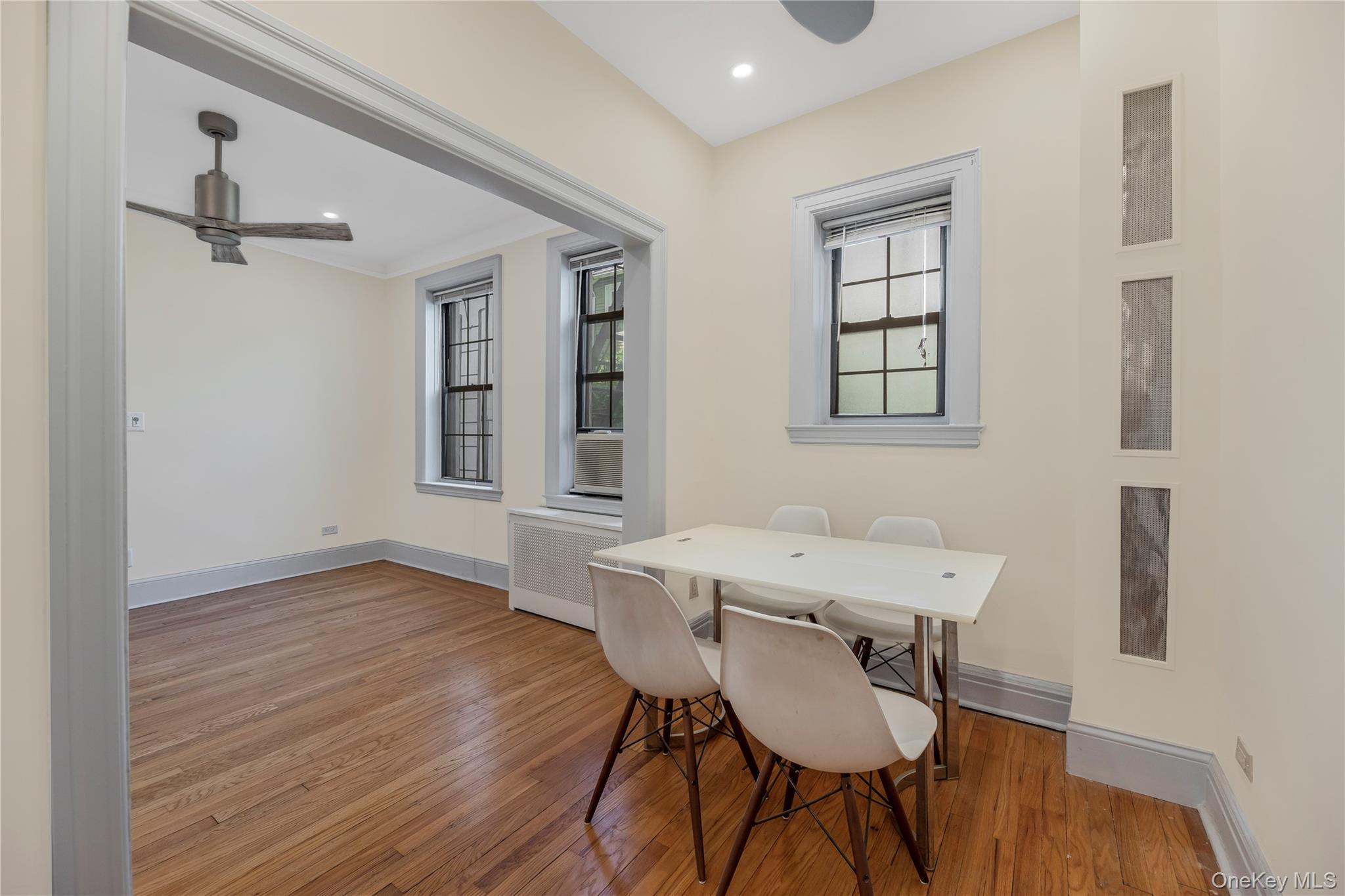26 Pondfield Road, Unit 1D Bronxville, NY 10708 - Photo 10 of 21 a view of a dining room with furniture and wooden floor