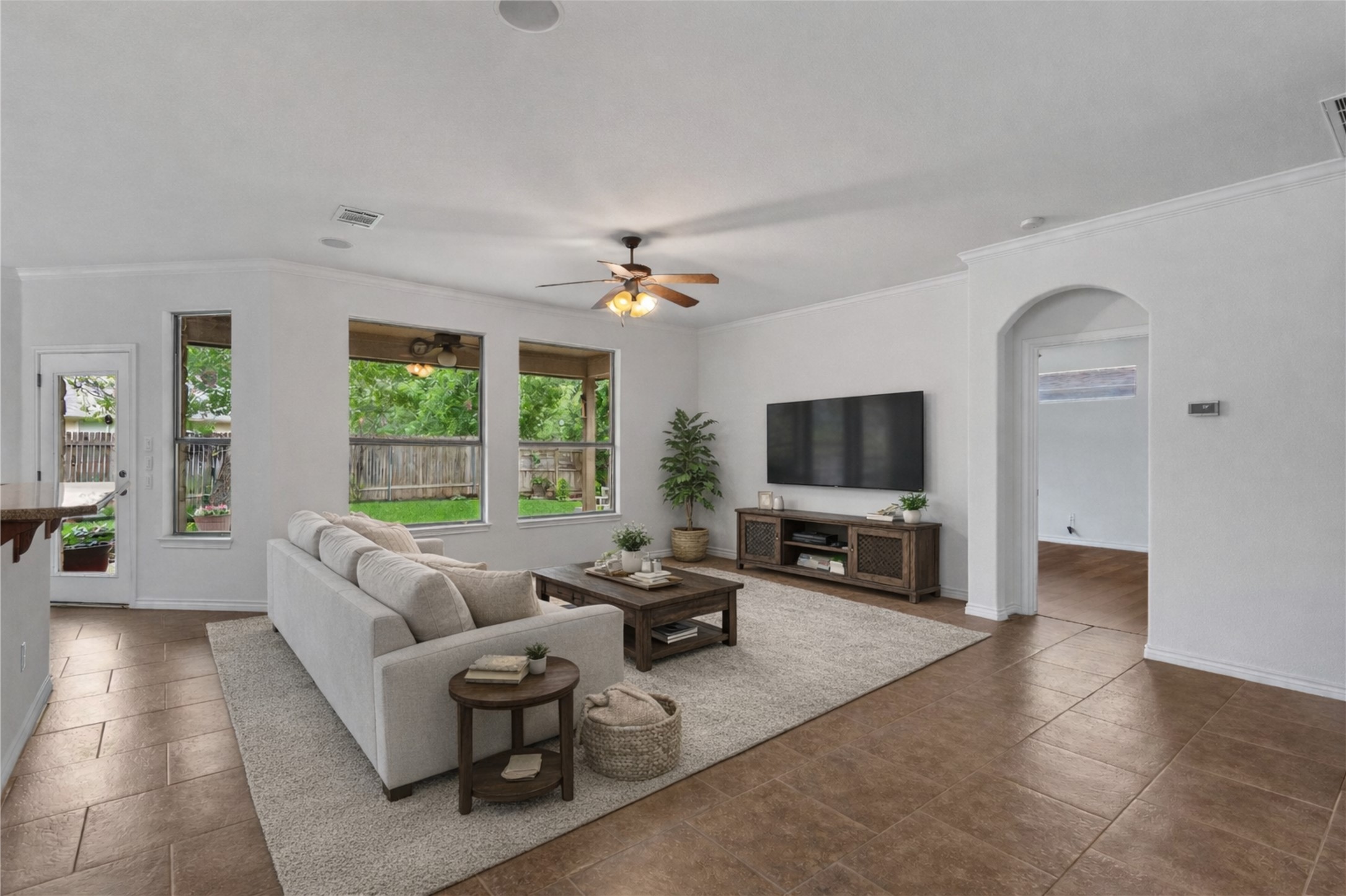 4612 Sonora Trace Georgetown, TX 78633 - Photo 2 of 36 a living room with furniture and a flat screen tv