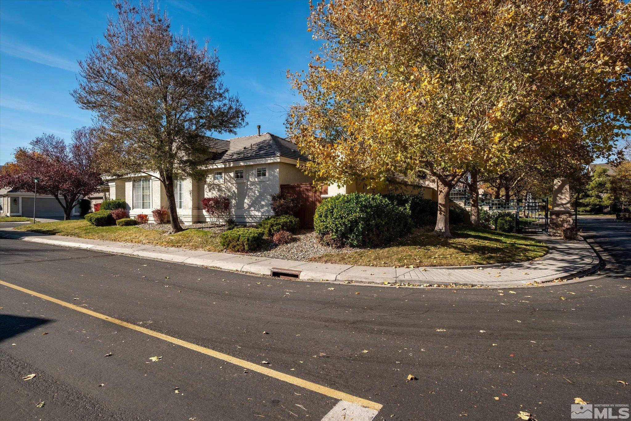 1197 Tule Drive Reno, NV 89521 - Photo 3 of 30 a view of city street with palm trees