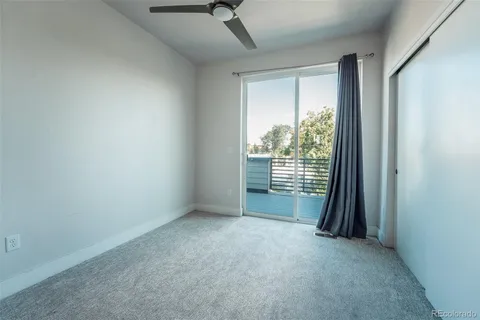 a view of a room with a large window