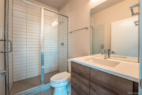 a bathroom with a sink and toilet