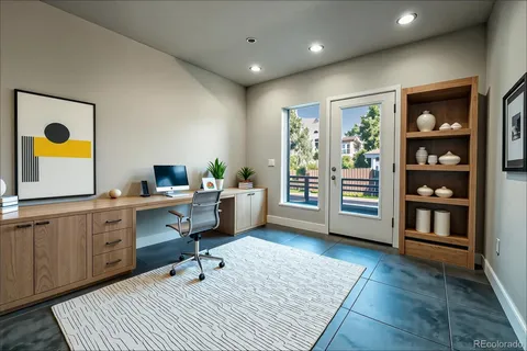 a workspace with furniture and window