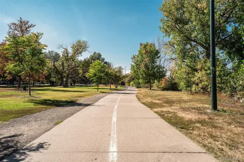 a view of swimming pool with trees