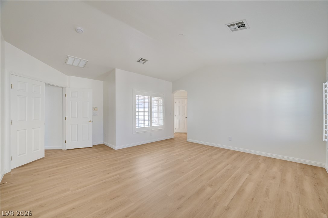 8918 Houston Ridge Avenue Las Vegas, NV 89178 - Photo 15 of 35 Luminous interior with new light-toned flooring, perfect for versatile design.