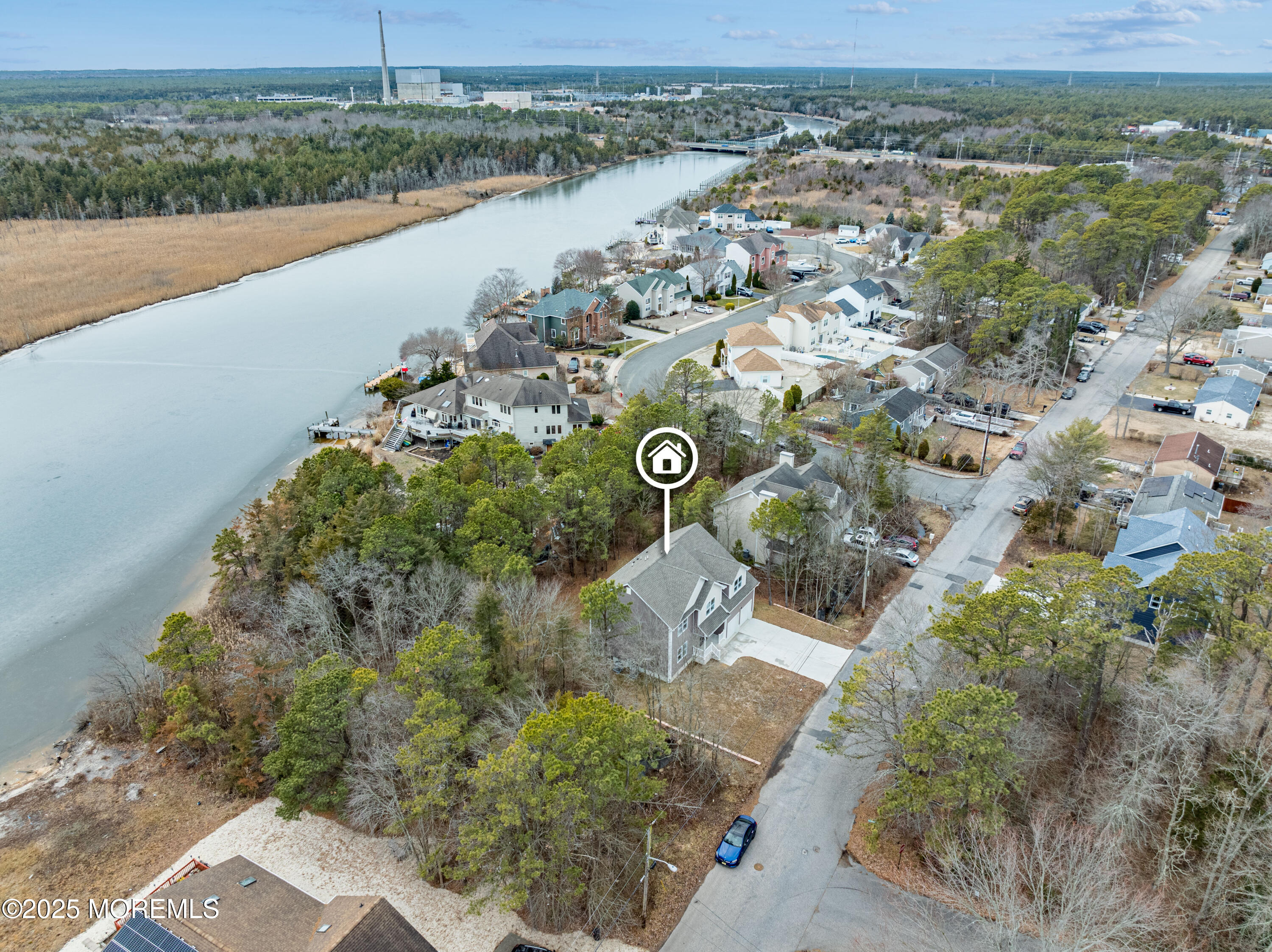 217 Nantucket Road Forked River, NJ 08731 - Photo 15 of 38 an aerial view of a house with a yard and lake view