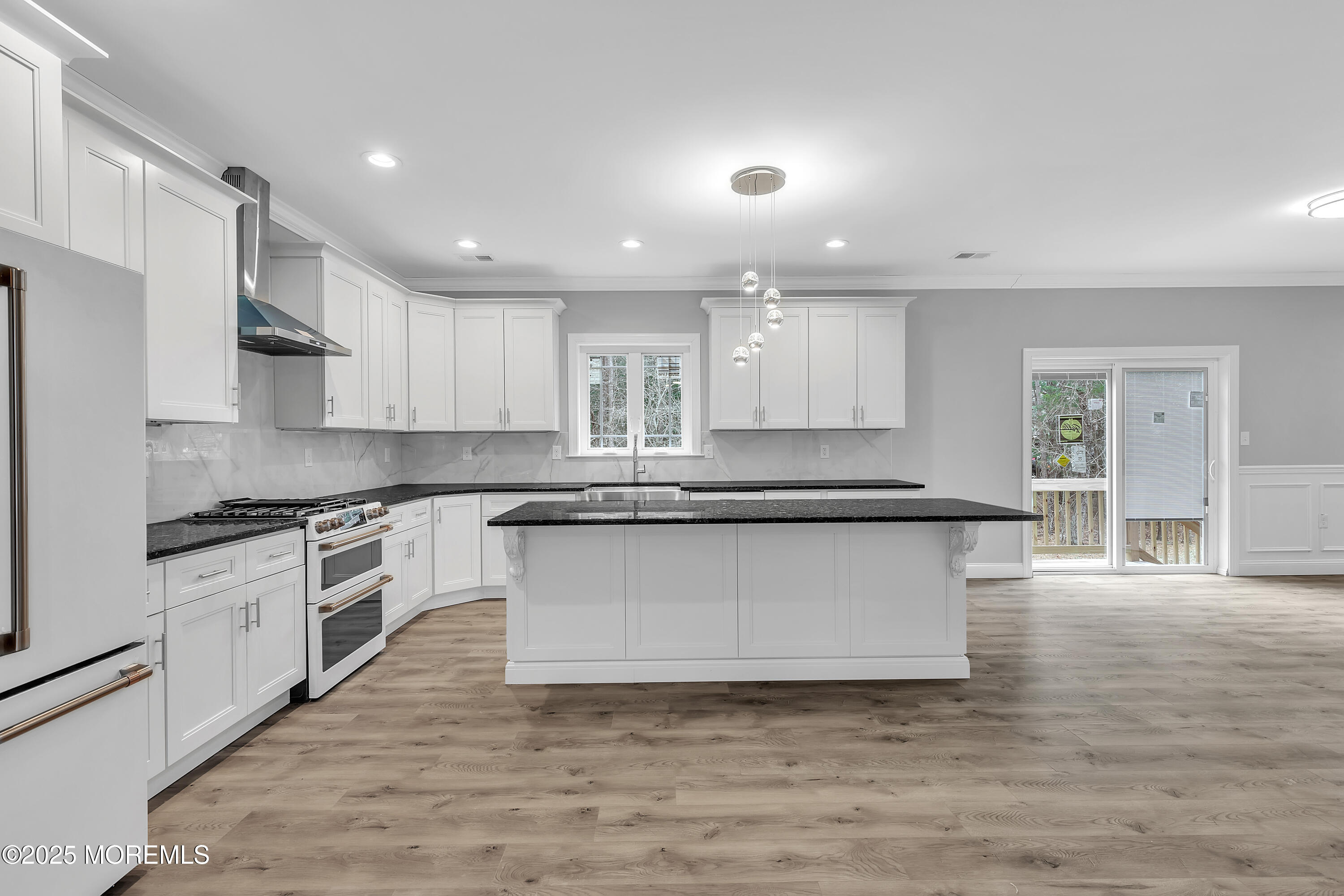 217 Nantucket Road Forked River, NJ 08731 - Photo 2 of 38 a large kitchen with stainless steel appliances granite countertop a stove a sink and a granite counter tops