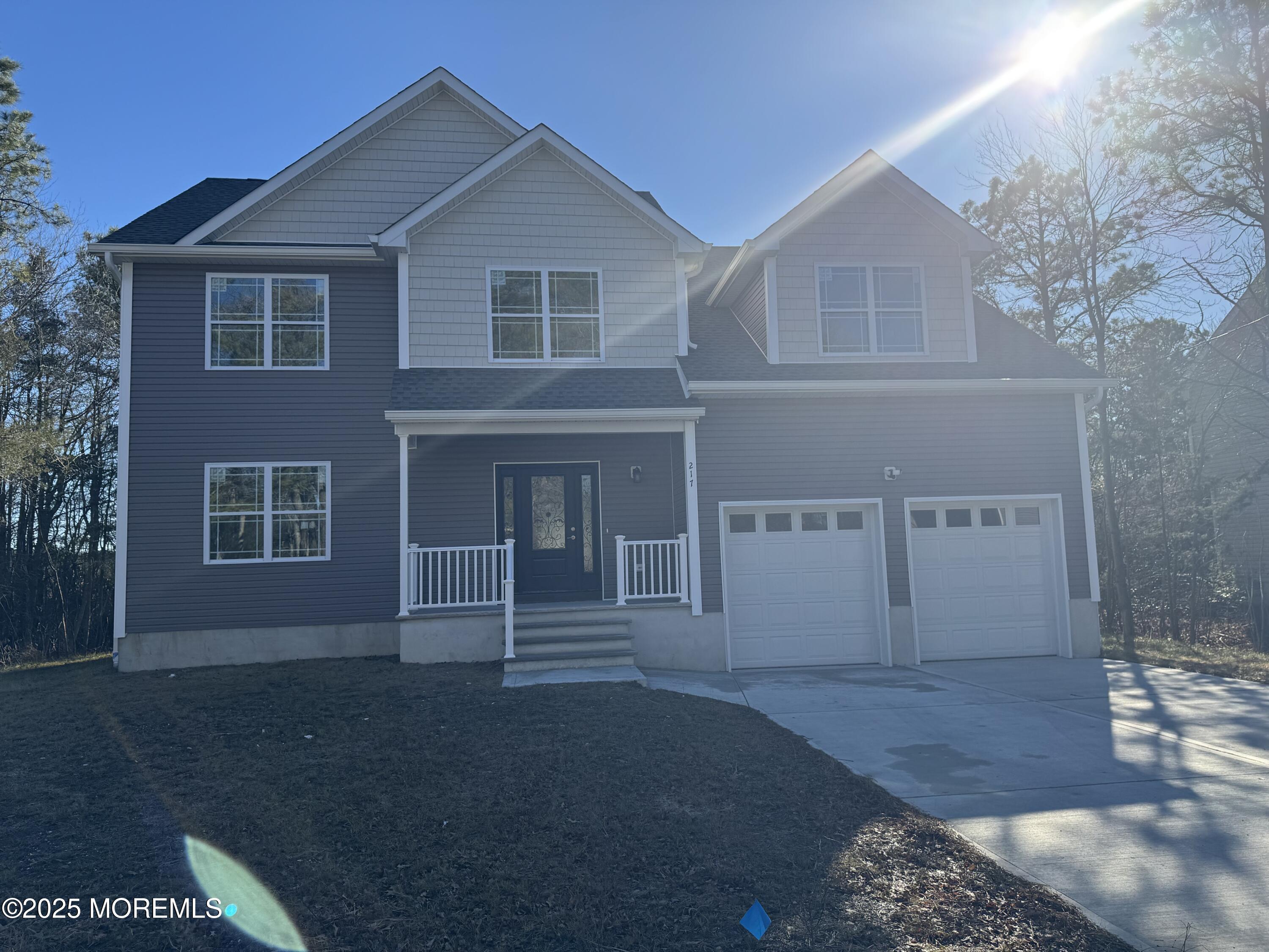 217 Nantucket Road Forked River, NJ 08731 - Photo 33 of 38 a front view of a house with a yard