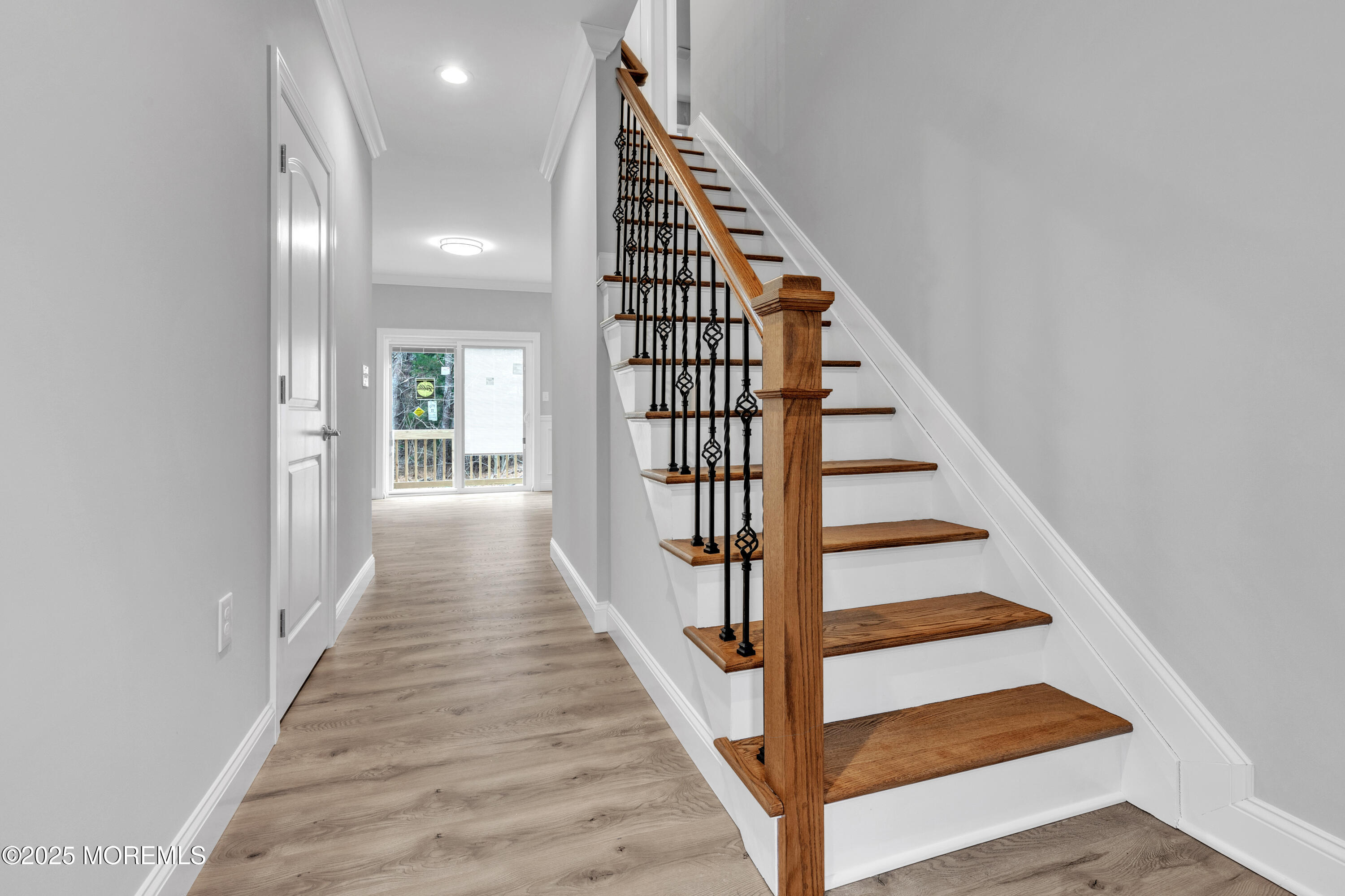 217 Nantucket Road Forked River, NJ 08731 - Photo 8 of 38 a view of entryway and hall with wooden floor