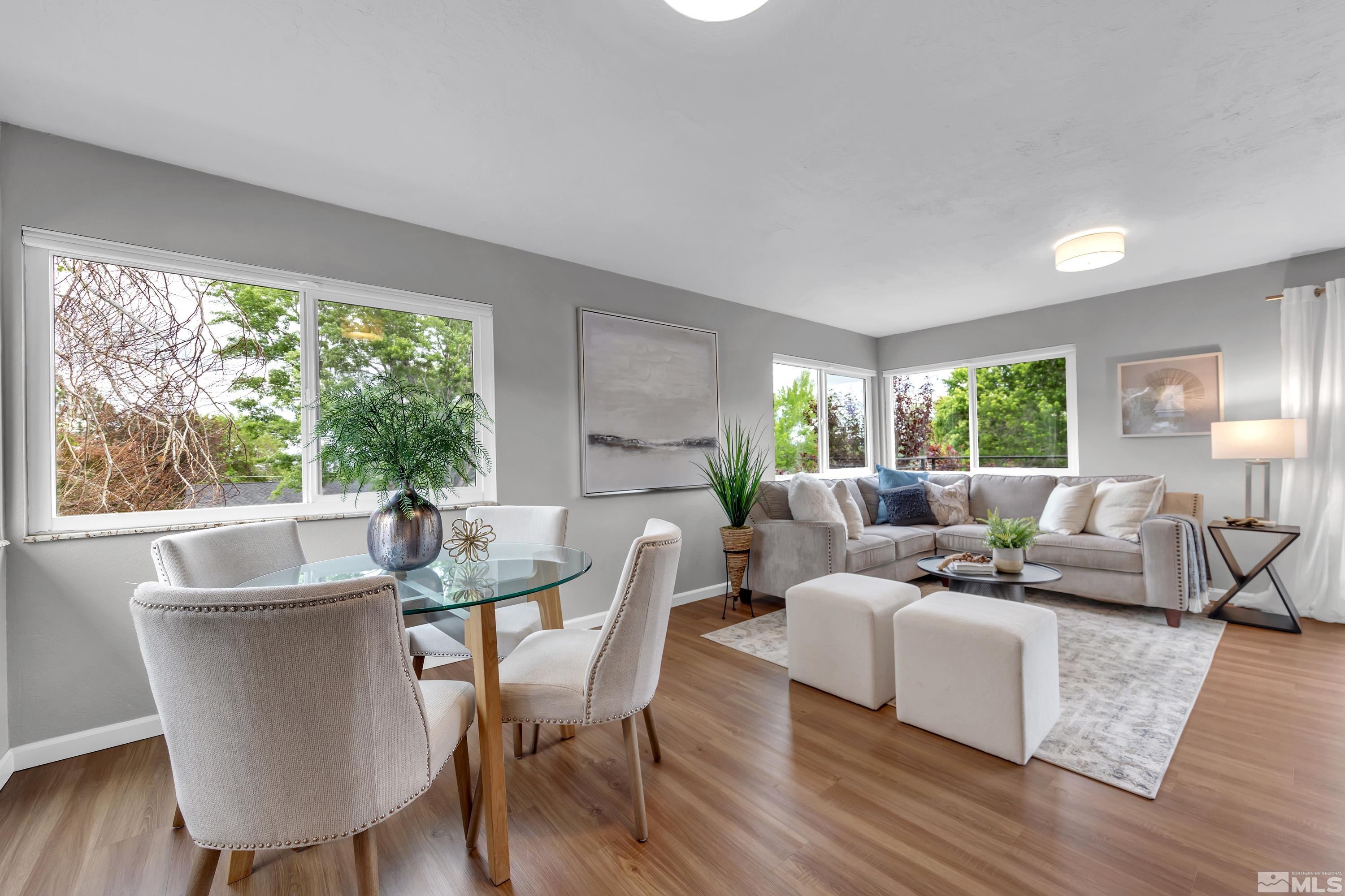 1415 Ebbetts Drive Reno, NV 89503 - Photo 17 of 36 a living room with furniture and a large window