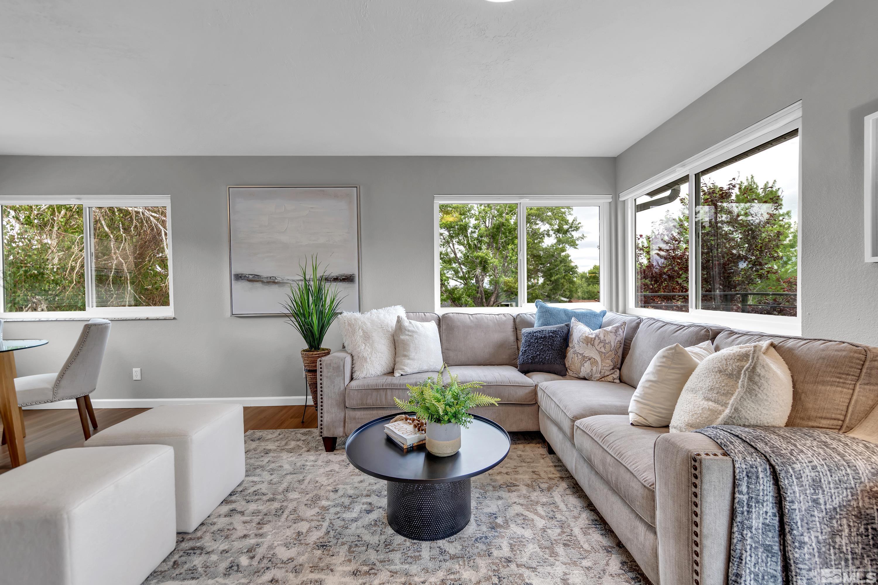 1415 Ebbetts Drive Reno, NV 89503 - Photo 21 of 36 a living room with furniture and a large window