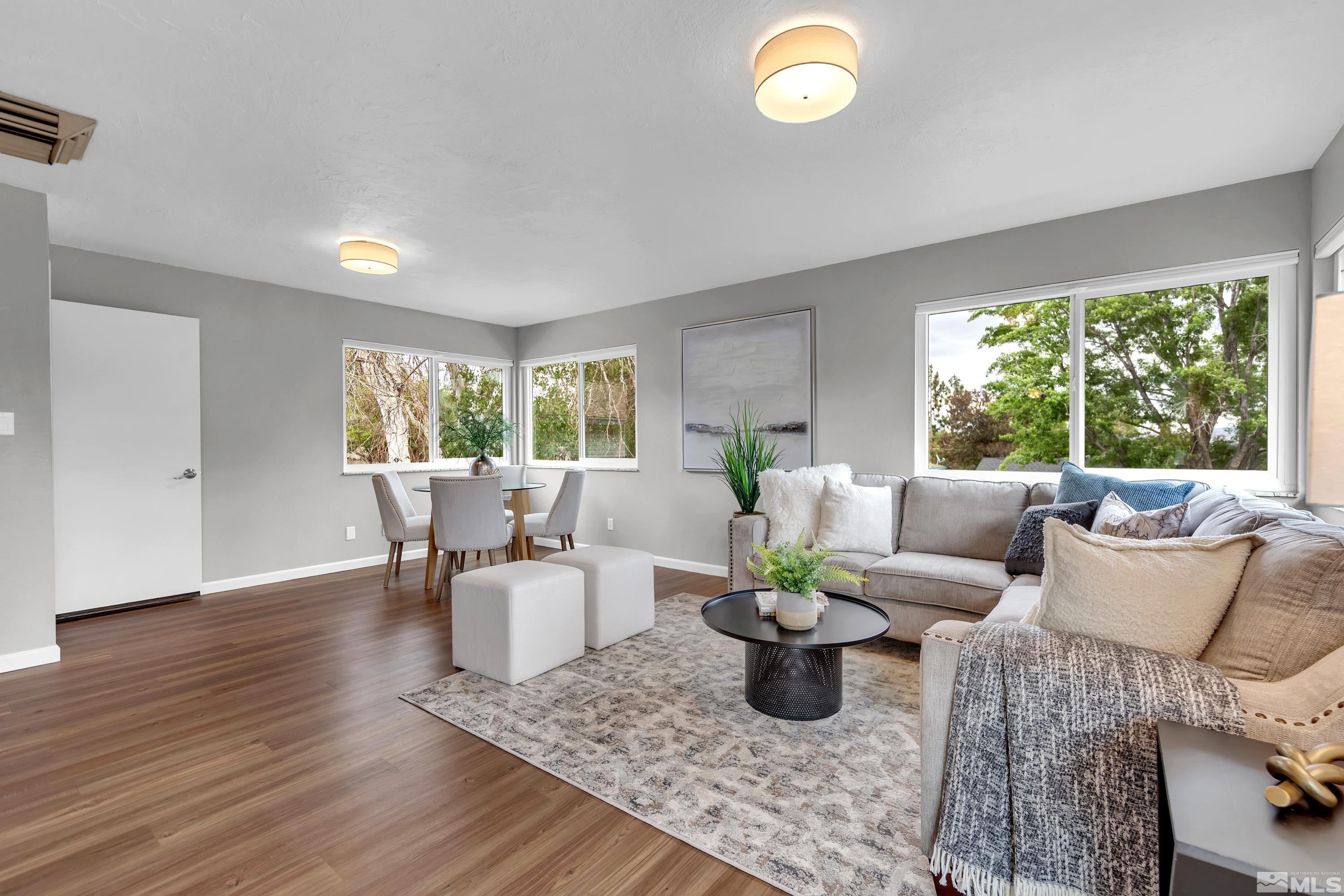 1415 Ebbetts Drive Reno, NV 89503 - Photo 22 of 36 a living room with furniture and a potted plant