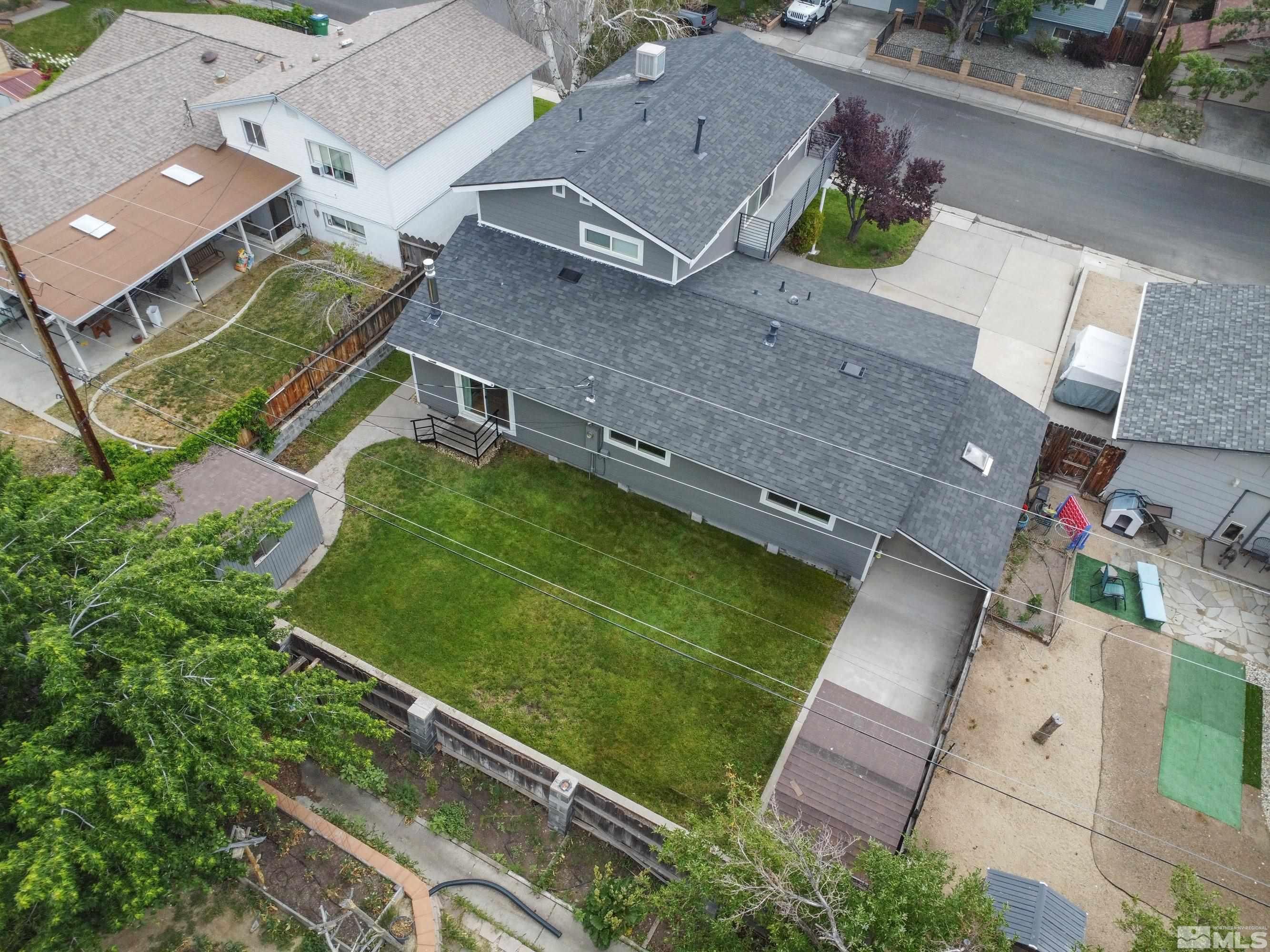 1415 Ebbetts Drive Reno, NV 89503 - Photo 34 of 36 an aerial view of a house with a garden