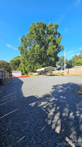 a view of swimming pool with a yard