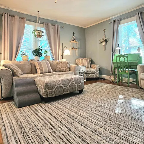 a bedroom with bed and a window