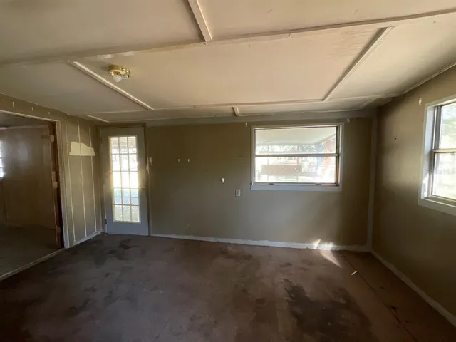 an empty room with windows