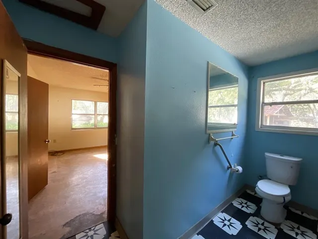 a bathroom with a toilet