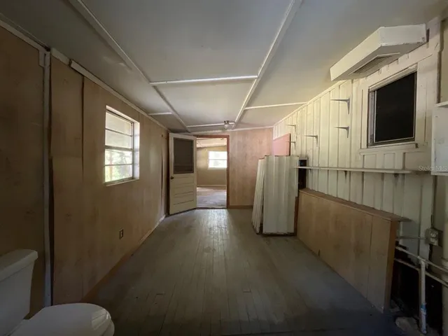 a view of hallway with stairs