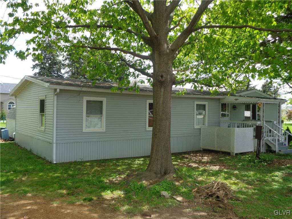 8859 Turkey Ridge Road Breinigsville, PA 18031 - Photo 2 of 11 a view of a house with a backyard