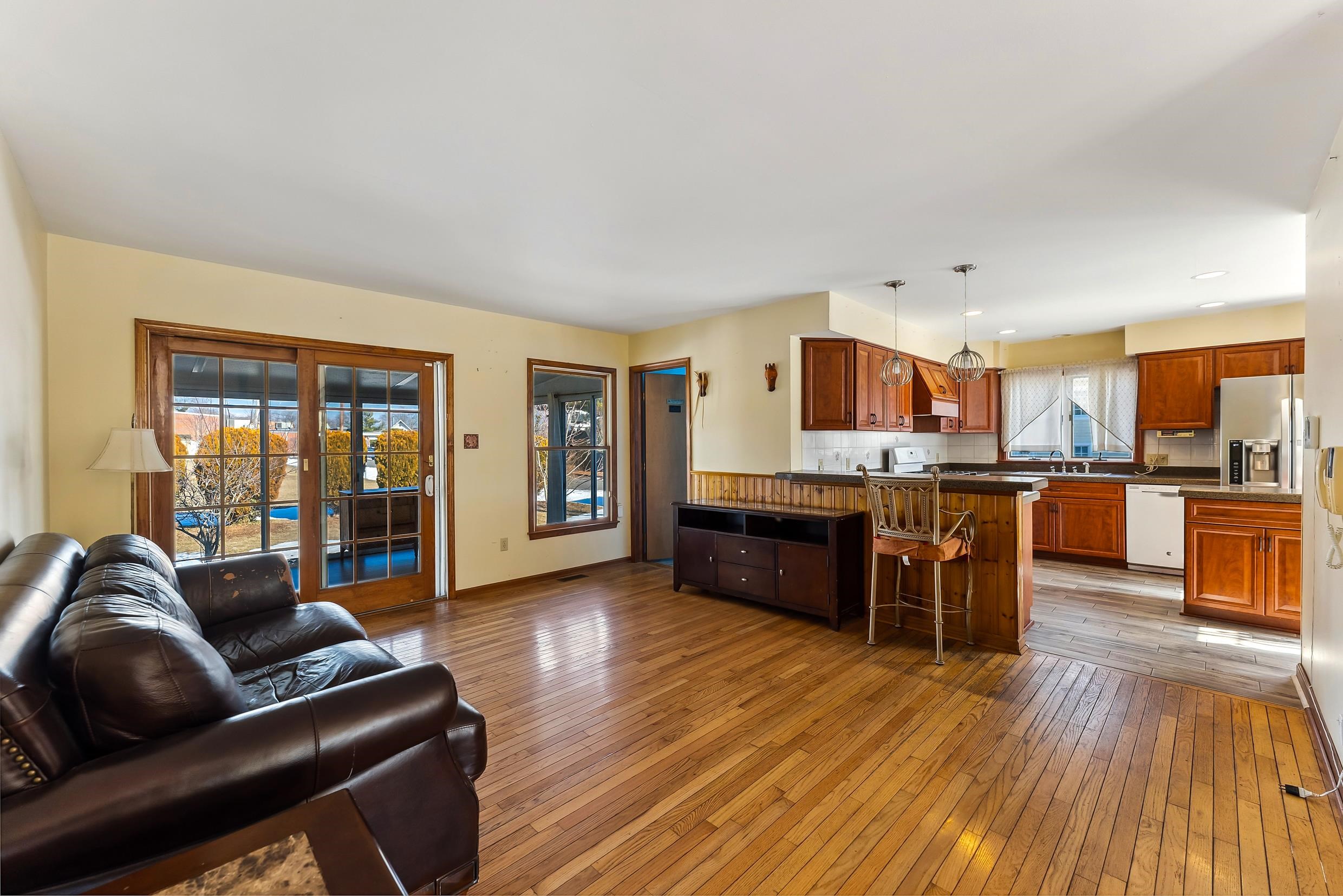 401 4th West Cape May, NJ 08204 - Photo 11 of 43 a living room with furniture and kitchen view