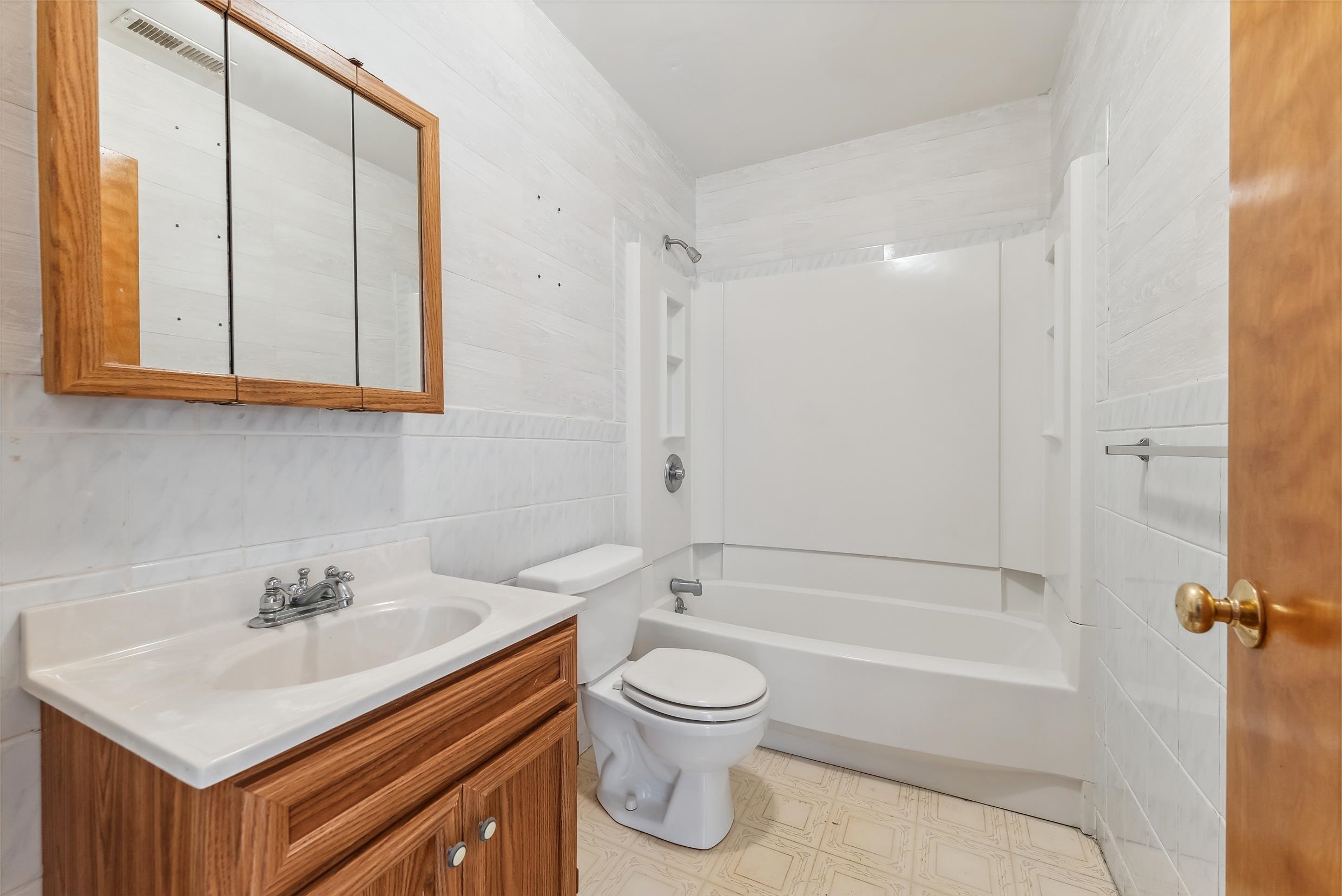 401 4th West Cape May, NJ 08204 - Photo 12 of 43 a bathroom with a sink toilet and shower