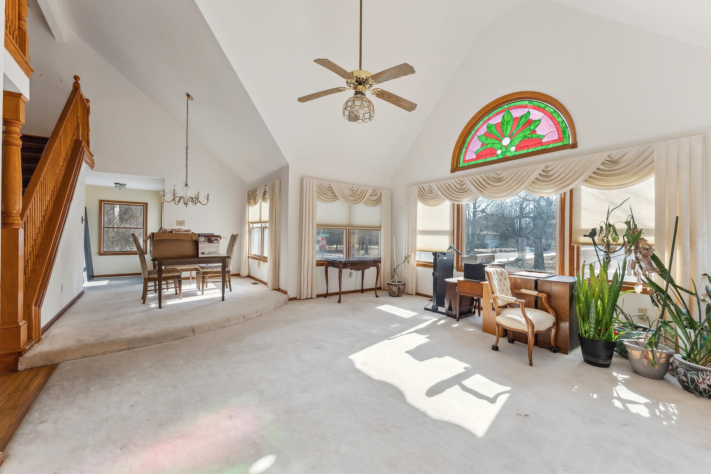 401 4th West Cape May, NJ 08204 - Photo 21 of 43 a living room with furniture a fireplace and a large window