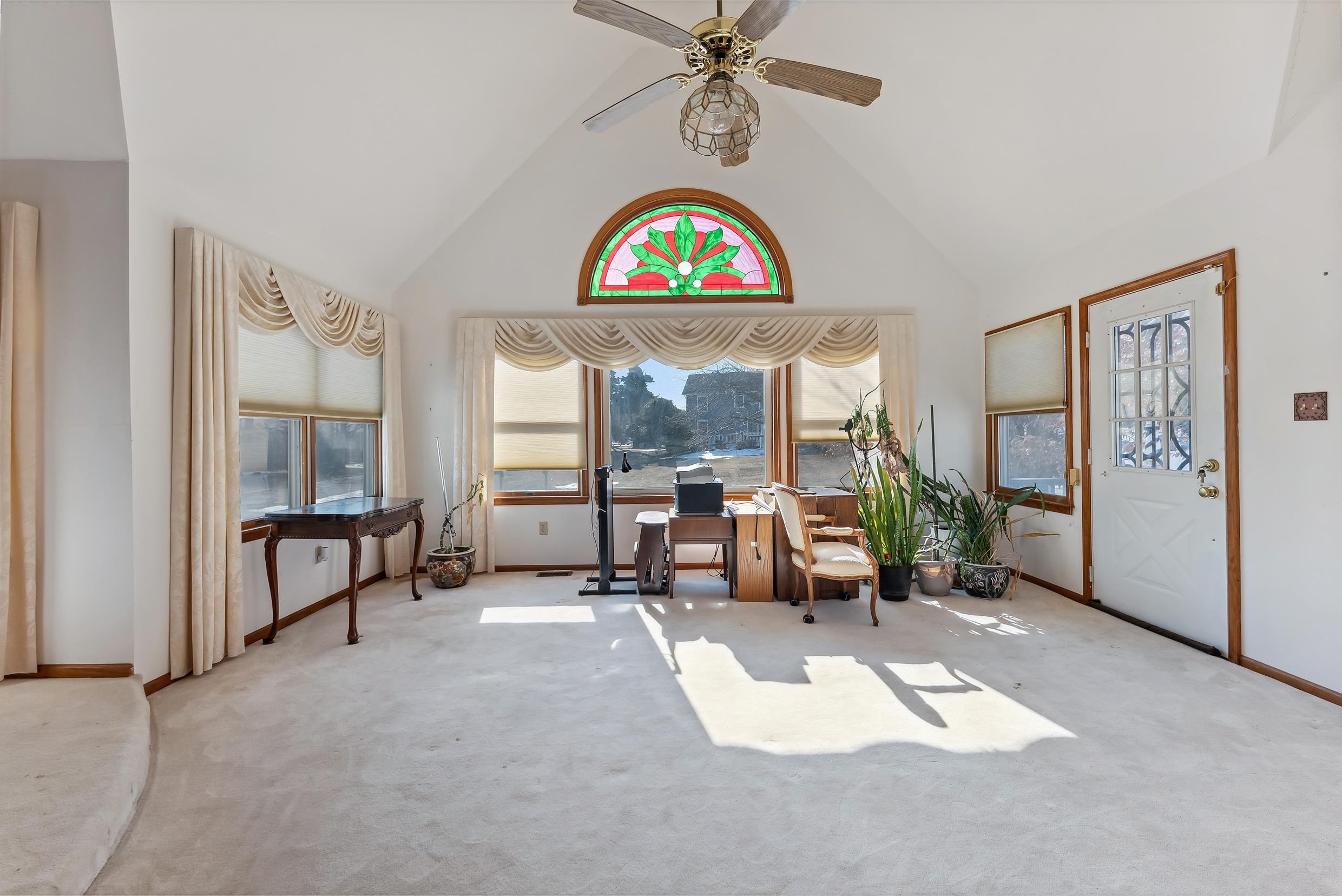401 4th West Cape May, NJ 08204 - Photo 24 of 43 a living room with furniture and a large window