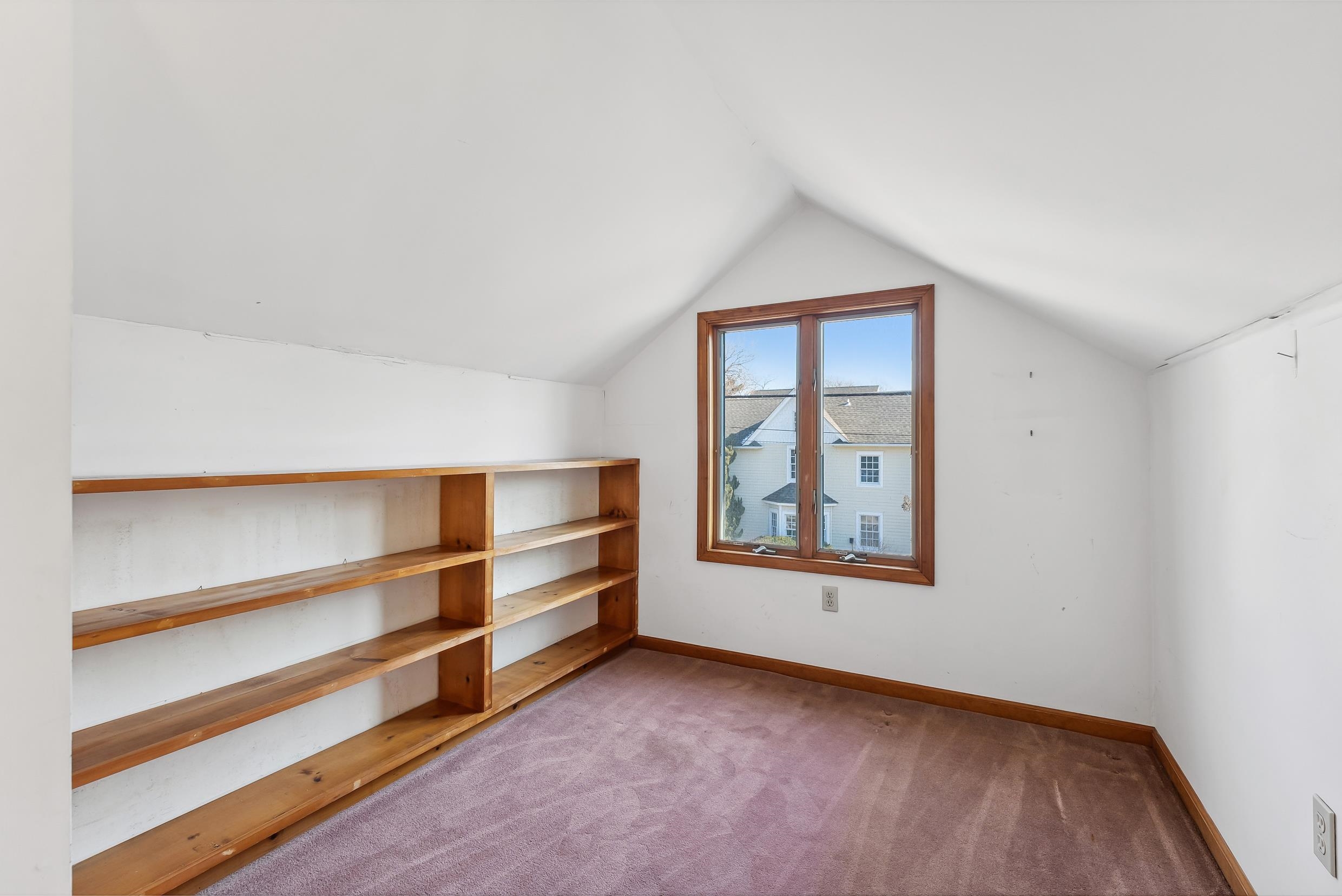401 4th West Cape May, NJ 08204 - Photo 27 of 43 a view of an empty room with a window and wooden floor