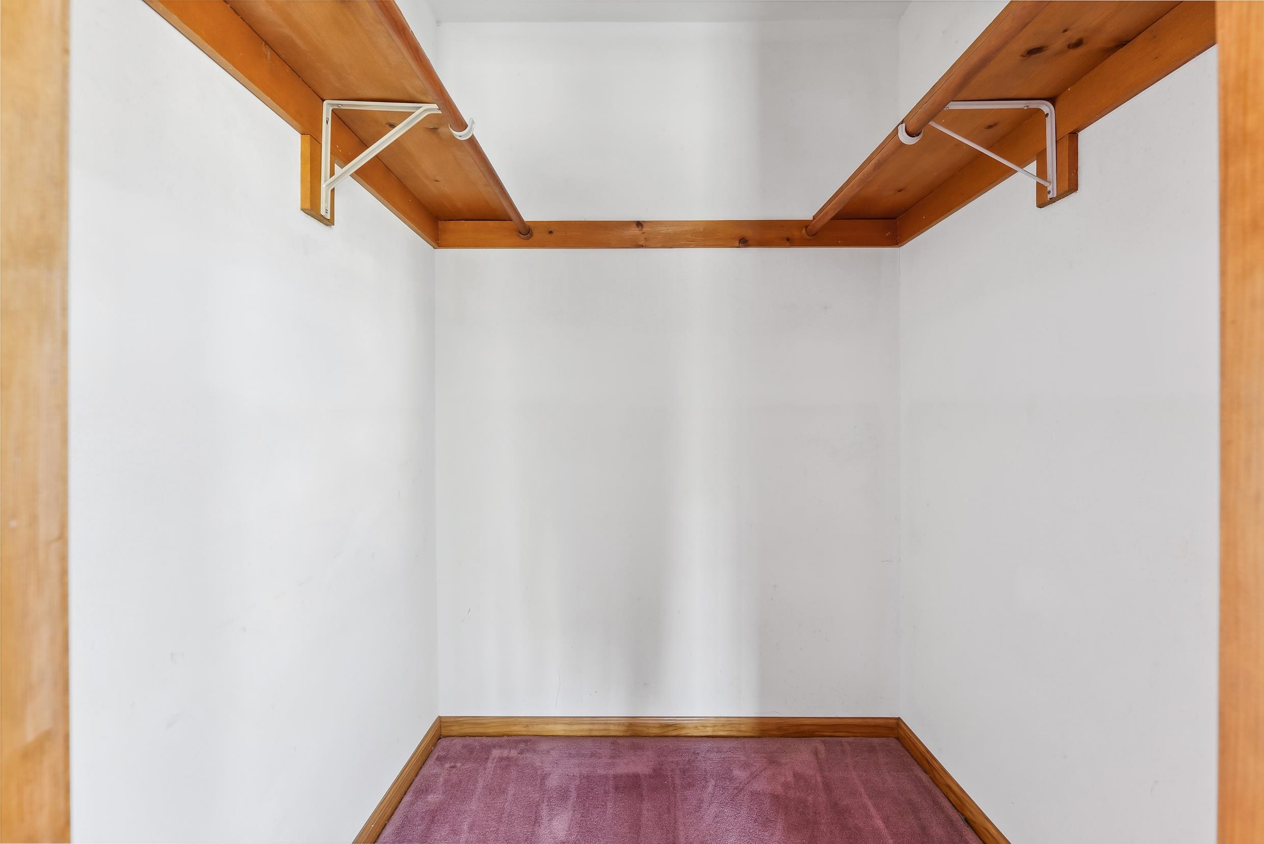 401 4th West Cape May, NJ 08204 - Photo 30 of 43 a view of walk in closet with clothes