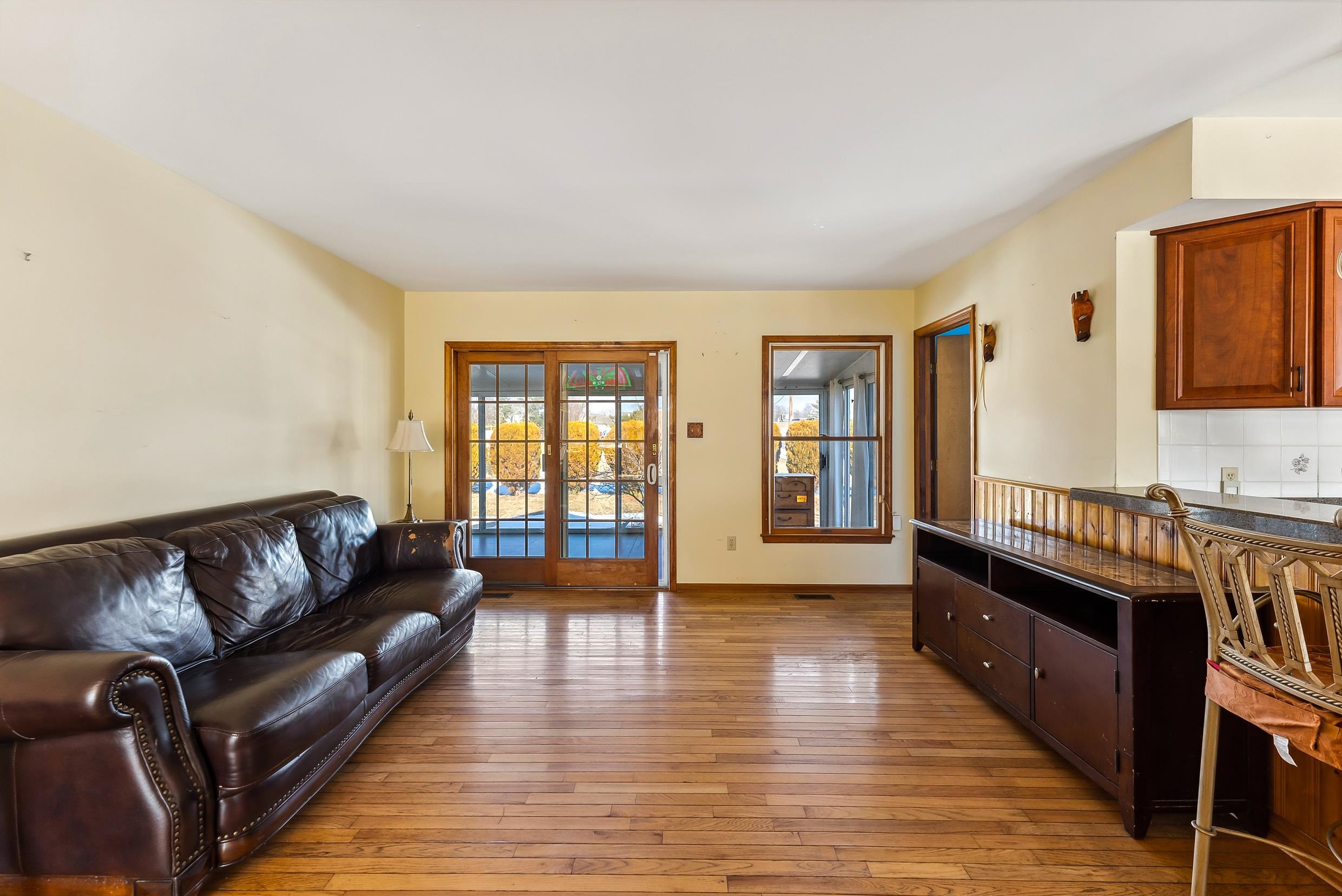 401 4th West Cape May, NJ 08204 - Photo 34 of 43 a living room with furniture window and wooden floor
