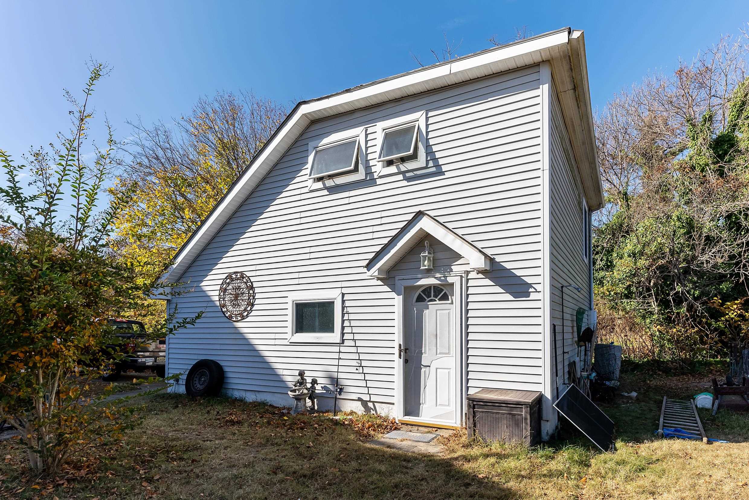 401 4th West Cape May, NJ 08204 - Photo 36 of 43 a view of a house with a yard