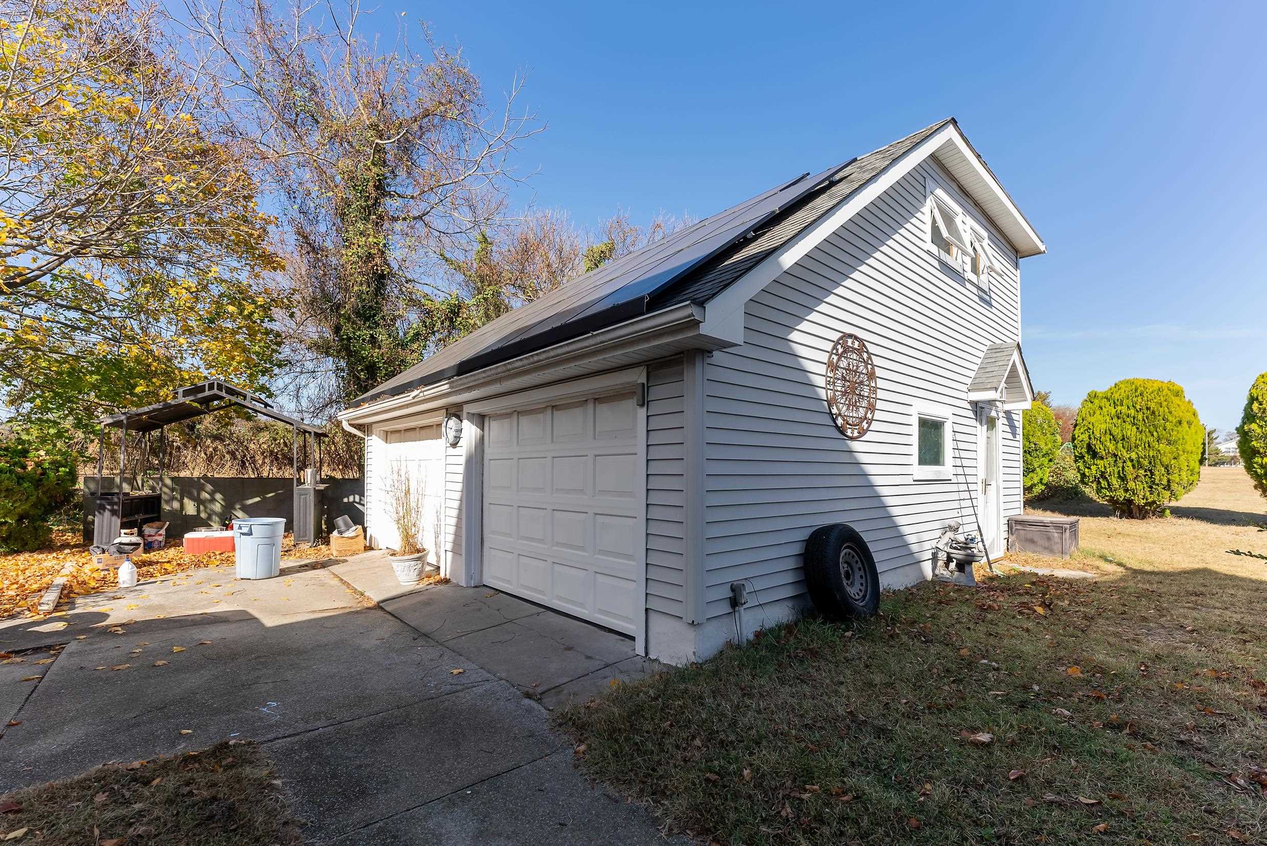401 4th West Cape May, NJ 08204 - Photo 37 of 43 a view of a house with a backyard