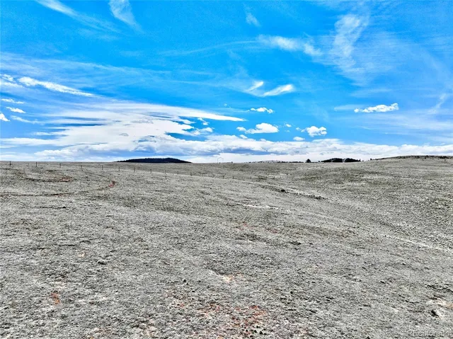 a view of water fountain and an ocean view