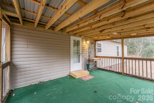 a view of backyard with green space