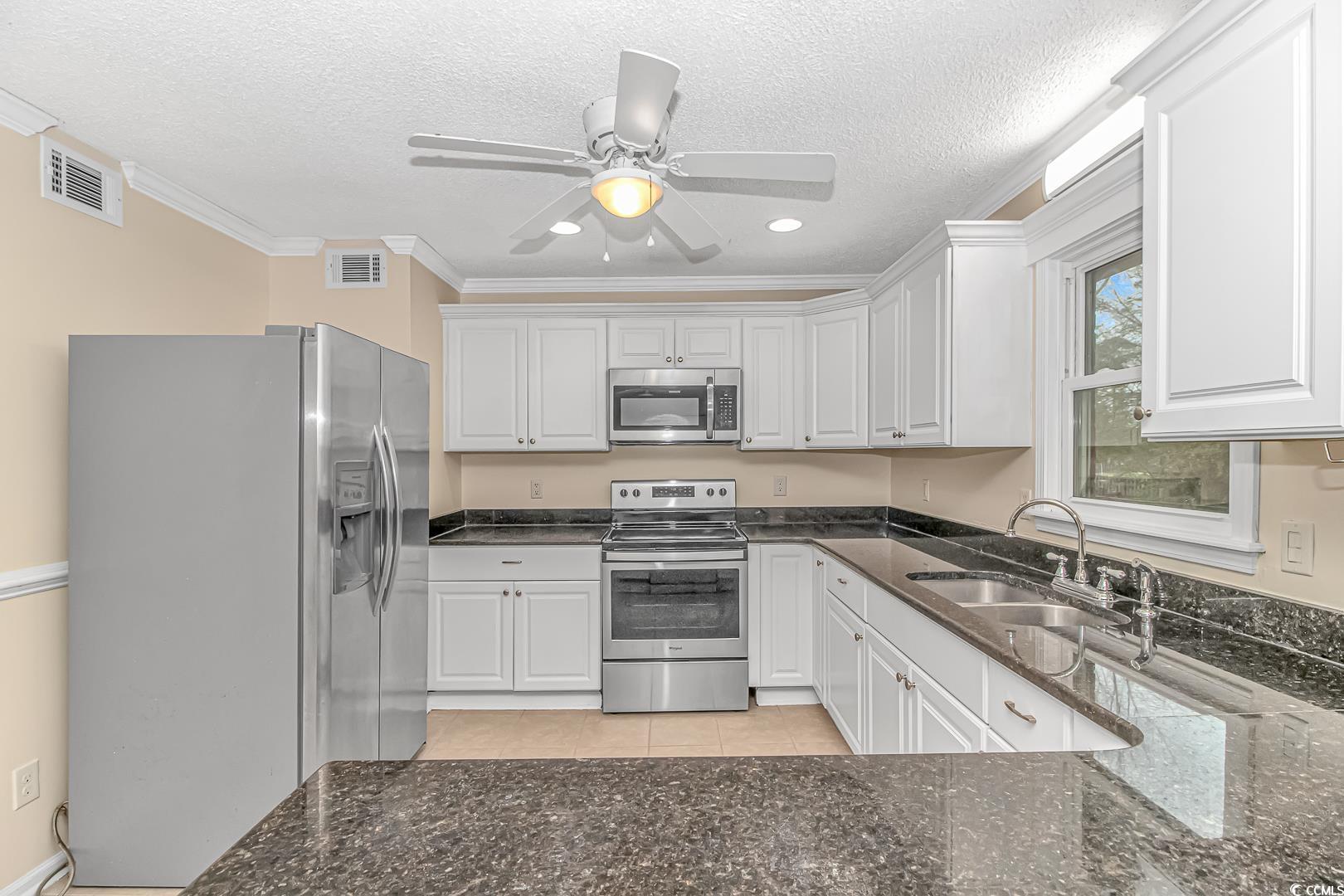 918 Forest Loop Road Conway, SC 29527 - Photo 5 of 26 Kitchen with appliances with stainless steel finis