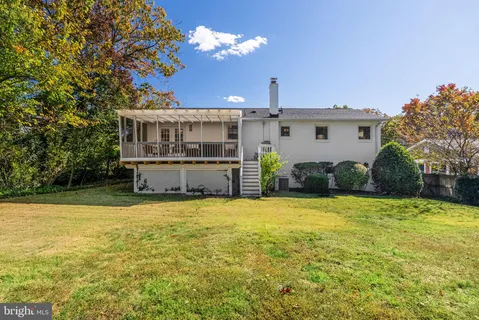 a view of a house with swimming pool