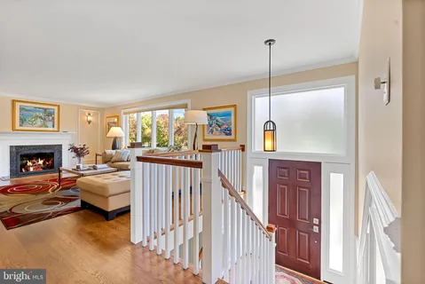 a view of a livingroom with furniture and a fireplace