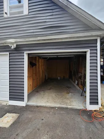 a view of backyard with a large window