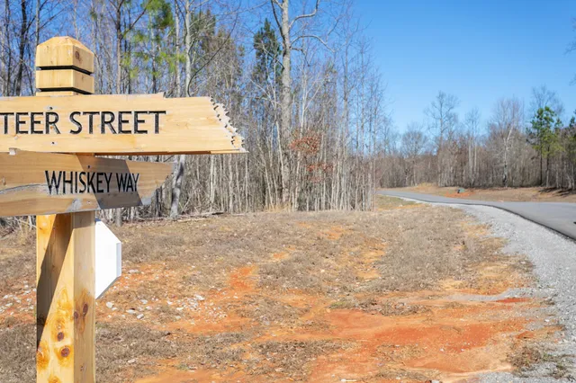 a sign that is on the side of the road